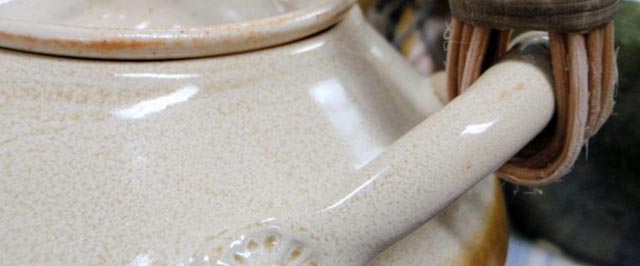 Cream stoneware teapot